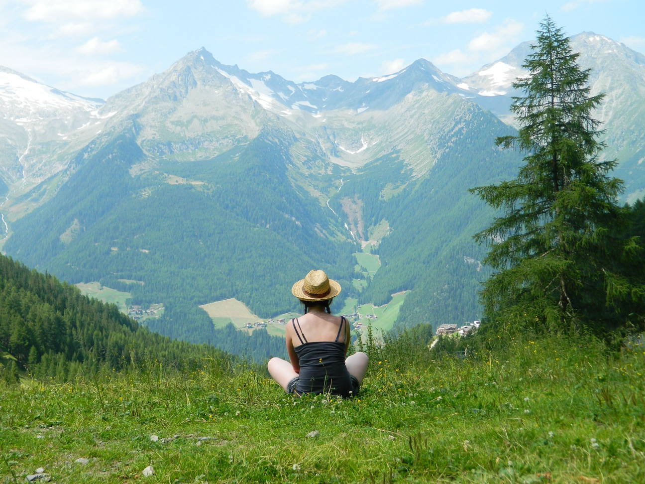 Female Tourist in a View of Mountain Alps